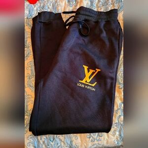 Received as a gift, not real LV, brand new. Womens XL sweatpants smoke free home